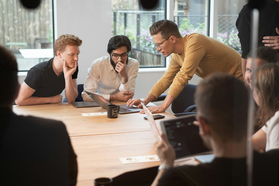 woman leading business meeting