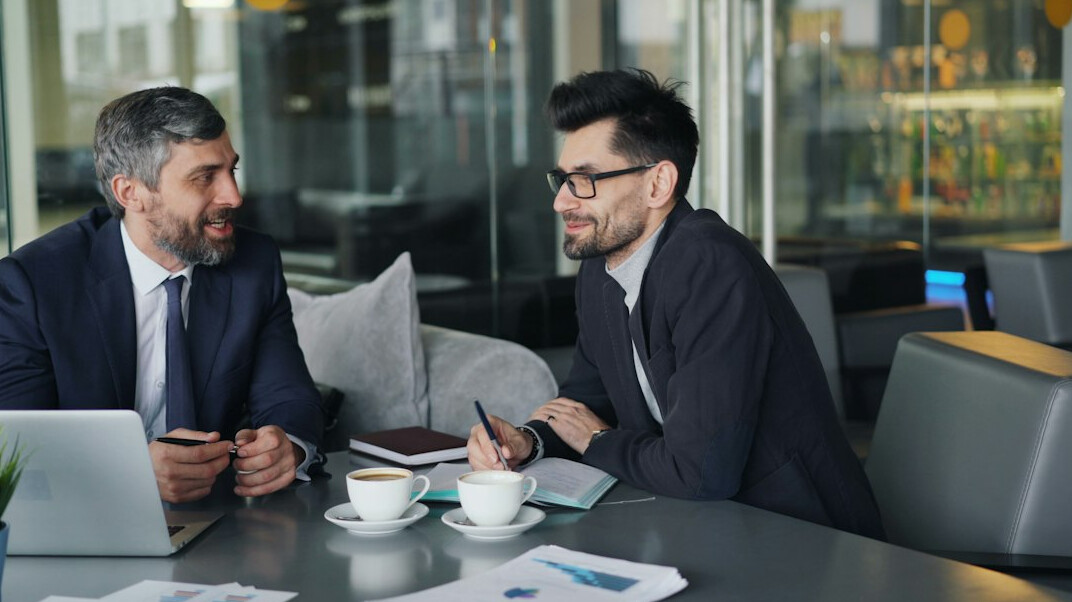 business professionals discussing emotions