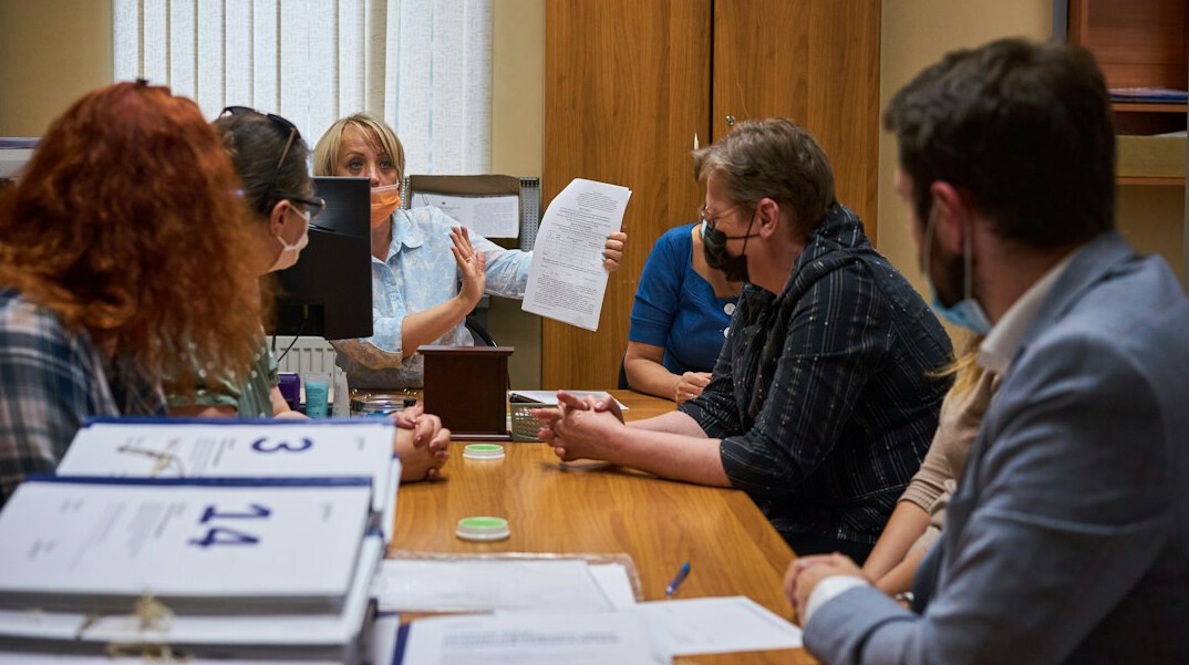 team reviewing notes after meeting