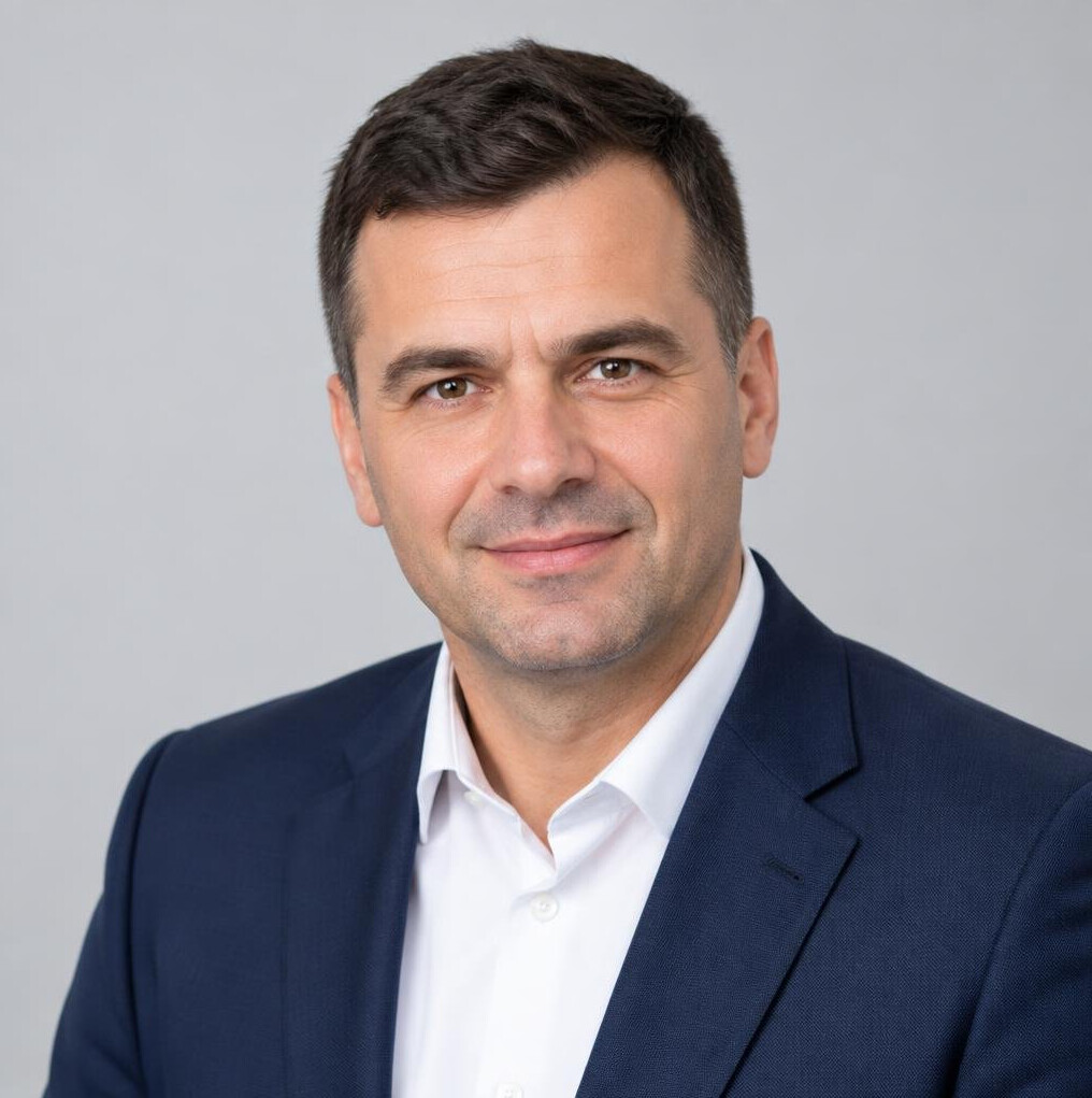Studio portrait of a Croatian man in business attire