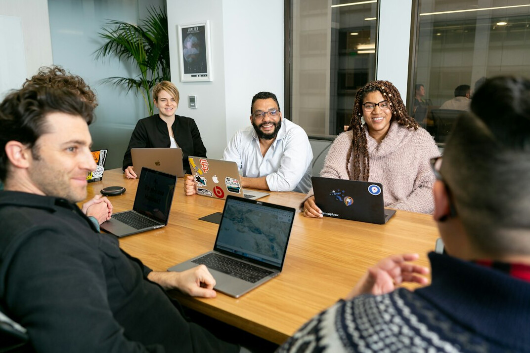 group of professionals in meeting